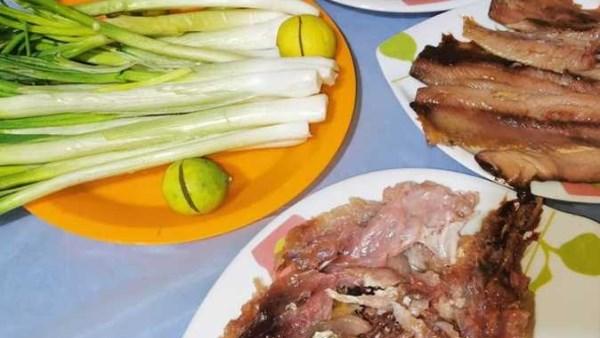 فوائد البصل الأخضر مع الرنجة والأسماك المملحة ودوره في تحسين الهضم