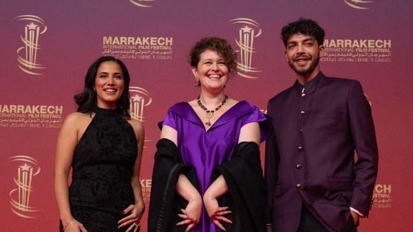 مشهد من العرض العالمي الأول لفيلم تحت أشجار النخيل في مهرجان مراكش السينمائي