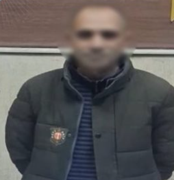 ضبط صاحب محل حلاقة بعد منع مواطن من ركن سيارته