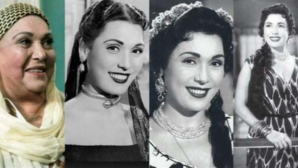 تحية كاريوكا في صورة أرشيفية مع الطفلة التي احتضنتها أمام باب شقتها