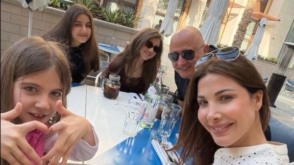 نانسي عجرم مع زوجها فادي الهاشم وبناتها الثلاثة في صورة عائلية دافئة 