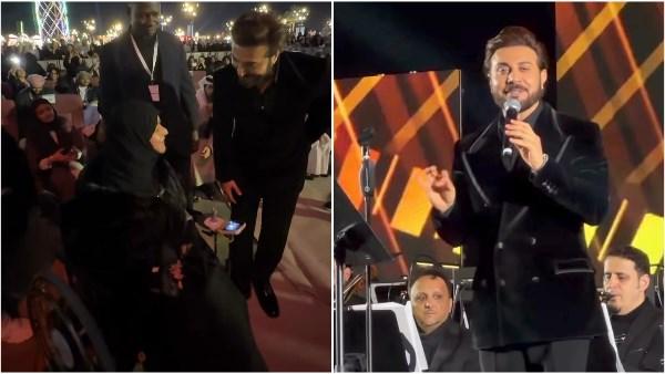 ماجد المهندس ينزل من المسرح ليلتقط صورًا مع معجبة على كرسي متحرك في مهرجان الشيخ زايد