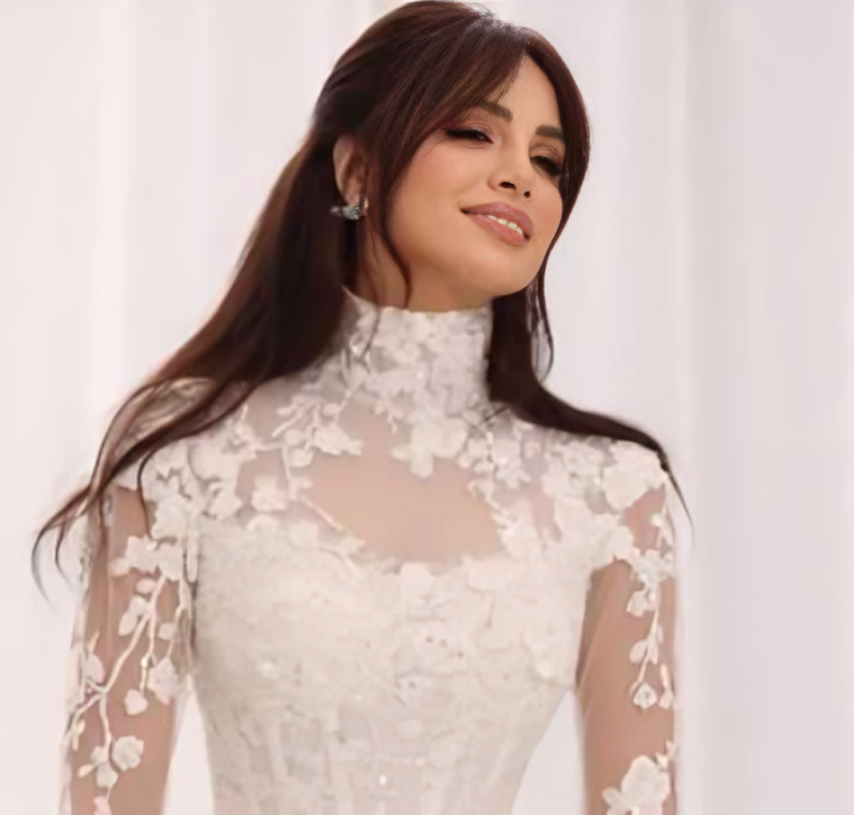 آمال ماهر بفستان زفاف من كليب "خبر عاجل"