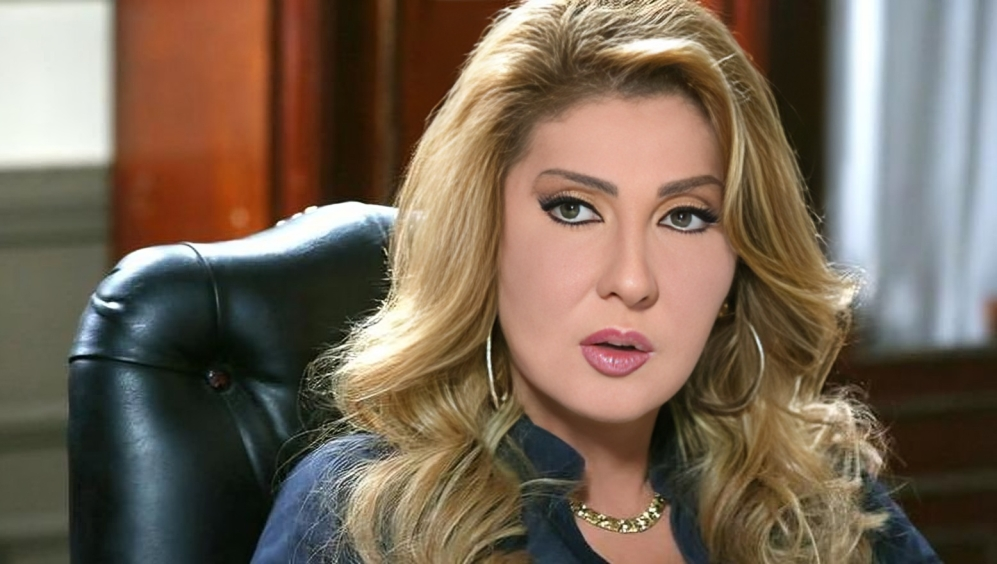 نادية الجندي تبتسم خلال حضورها مناسبة خاصة.