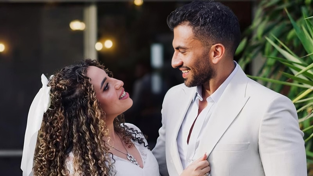 منة عدلي القيعي ويوسف حشيش أثناء حفل الزفاف.