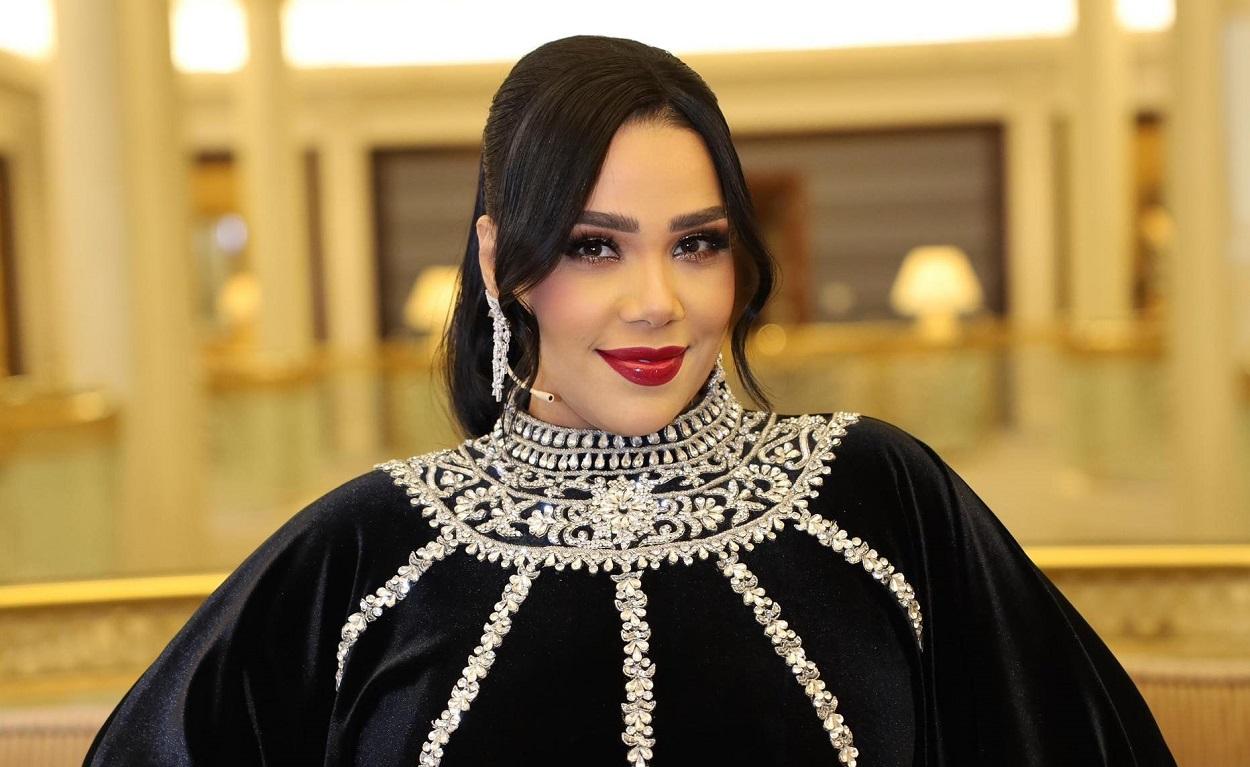 شيماء سيف وكارتر أثناء إعلان عودتهما بعد الانفصال